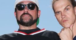 Kevin Smith and Jason Mewes pose together, showcasing their iconic styles linked to "Jay & Silent Bob Strike Back.