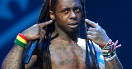 Lil Wayne performing energetically on stage, showcasing his tattoos and unique fashion style at a live concert event.