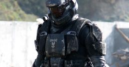 UNSC Halo Marine in tactical armor, equipped with a weapon and gear, navigating a rugged environment.