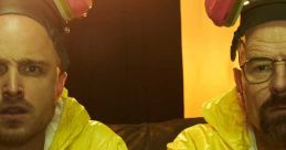 Walter White and Jesse Pinkman in iconic yellow hazmat suits, captured in a tense moment from the series Breaking Bad.