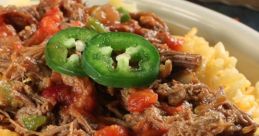 Tender shredded beef served over fluffy rice, topped with fresh jalapeños and diced tomatoes for a flavorful meal.