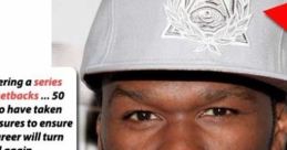 50 Cent discusses career setbacks and plans for a comeback at a media event, wearing a gray cap and gray shirt.