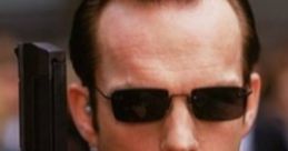 Agent Smith holding a gun in sunglasses, embodying an iconic prank call character. Perfect for "Prank Call Clips: Agent Smith.