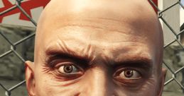 Close-up of Trevor from GTA, showcasing his intense expression against a background of metal fencing and warning signs.