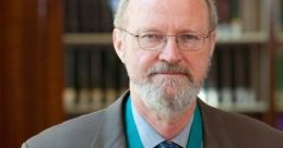 Portrait of a distinguished man wearing a medal, showcasing achievements and contributions in his field, possibly academia.