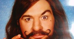 Mike Myers as a guru with a mustache, holding a flower, promoting "The Love Guru" movie with a fun, colorful background.