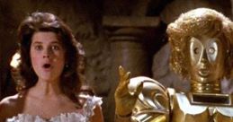 Princess Vespa and Dot Matrix in a comedic scene from the cult classic Spaceballs, showcasing sci-fi humor and memorable characters.