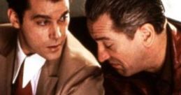 Two characters from "Goodfellas" share a tense conversation, capturing the film's intense crime drama atmosphere.