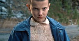 Eleven from Stranger Things, showcasing her intense expression and iconic outfit in a dramatic outdoor setting.