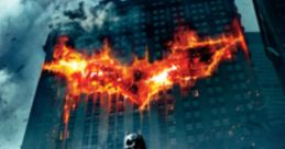 Batman stands dramatically in front of a burning Gotham skyline, showcasing iconic imagery from "The Dark Knight" film.