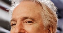 Alan Rickman smiling, known for his iconic roles in film and theater, showcasing his signature silver hair and charismatic presence.