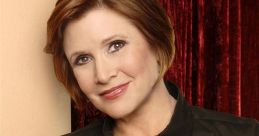 Carrie Fisher with short hair in a black blouse, smiling against a red background, showcasing her iconic charm and style.