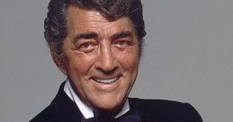 Dean Martin smiles charmingly in a tuxedo, showcasing his iconic style and charisma as a legendary entertainer.