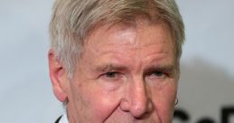 Harrison Ford in a tuxedo with a bow tie, showcasing his timeless style at a formal event. Iconic actor known for classic roles.