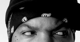 Close-up portrait of Ice Cube showcasing his signature style with a bandana and intense expression, reflecting his iconic persona.