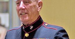 Lee Ermey in military uniform, displaying medals, showcasing his distinguished service and dedication as a Marine.