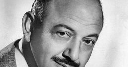 Mel Blanc, iconic voice actor known as the "Man of a Thousand Voices," in a classic black-and-white portrait.