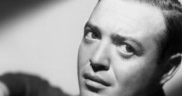 Stunning black and white portrait of Peter Lorre, capturing his intense gaze and classic 1940s style.