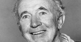 Walter Brennan smiles warmly, showcasing his iconic roles in classic Hollywood films and his memorable character portrayals.