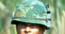 Soldier in camouflage helmet focused intently, embodying themes of bravery and resilience from "Forrest Gump.