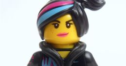 LEGO Lucy Wyldstyle figure with vibrant hair and graffiti-inspired attire, showcasing her unique style and character design.