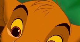 Close-up of Simba, the young lion, featuring his curious expression and vibrant eyes against a lush green background.