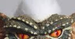 Vibrant close-up of a Gremlin from "Stripe And The Evil Gremlins," showcasing its mischievous expression and sharp teeth.