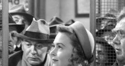 A woman at a bank counter, surrounded by anxious citizens, captures the emotional atmosphere of "It's a Wonderful Life.