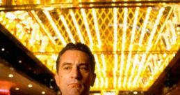 Robert De Niro as Sam "Ace" Rothstein in Casino (1995), exuding confidence in a vibrant Las Vegas casino setting.