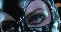 Close-up of Catwoman in "Batman Returns" (1992) showcasing her striking black mask and intense expression.