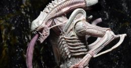 Detailed alien figure showcasing intricate design and menacing features, emphasizing the fascination with extraterrestrial life.