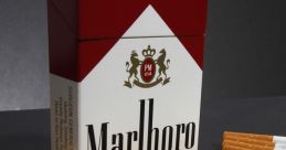 Marlboro filter cigarettes pack surrounded by neatly arranged cigarettes, emphasizing classic smoking culture.