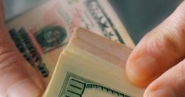 Hands counting cash, showcasing stacks of hundred-dollar bills, symbolizing wealth and financial transactions.