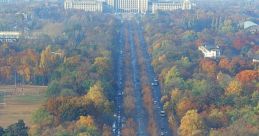 Arc de Triomphe in Bucharest, Romania, surrounded by autumn foliage and busy traffic, showcasing the vibrant city landscape.