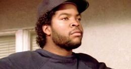 Doughboy from "Boyz n the Hood" wearing a Detroit cap and oversized sweatshirt, embodying street culture and resilience.