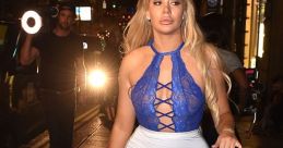 Chloe Ferry steps out in a striking blue bodysuit and white dress, showcasing her glamorous style in Geordie Shore nightlife.