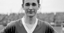 Young Brian Clough in football kit, smiling on the field, showcasing his early passion for the sport and future success.