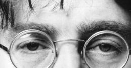 Close-up portrait of John Lennon, featuring his iconic round glasses and thoughtful expression, capturing his artistic essence.