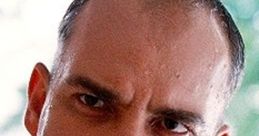 Close-up of Karl from "Sling Blade," showcasing his intense expression and distinct hairstyle. Iconic character portrayal.