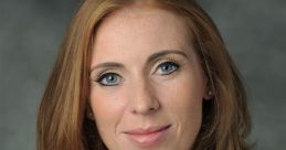 Angela Rayner with a professional hairstyle, wearing a suit, smiling confidently against a neutral background.