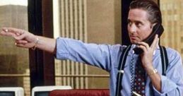 Gordon Gekko on the phone in his office, embodying the power and ambition of Wall Street's financial elite.