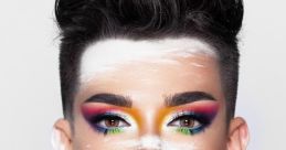 Bold makeup look by James Charles featuring vibrant colors, artistic face paint, and cosmetics application technique.