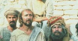 A group of characters from Monty Python's 'Life of Brian' dressed in ancient attire, showcasing humor and satire.