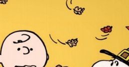 Charlie Brown serves food to Snoopy for Thanksgiving, surrounded by autumn leaves and a festive table setting.