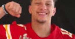 Patrick Mahomes celebrating in a red Kansas City Chiefs jersey, flexing his bicep and showing team spirit.