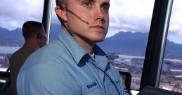 Air traffic controller in uniform focused on the job, overseeing aircraft operations in a control tower setting.