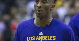 Kobe Bryant warming up with a basketball, wearing a Los Angeles Basketball shirt, showcasing his iconic style and skill.