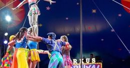 Colorful circus performers executing an acrobatic human pyramid under the big top, showcasing vibrant costumes and teamwork.