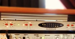 Professional audio equipment setup featuring Aurora B and D-Box for high-quality analog sound processing.