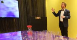 Host your own game show setup with a vibrant table, green balls, and a presenter in a stylish venue. Fun and engaging experience!